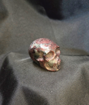 Garnet in Arfvedsonite Small Polished Crystal Skull 2 inches